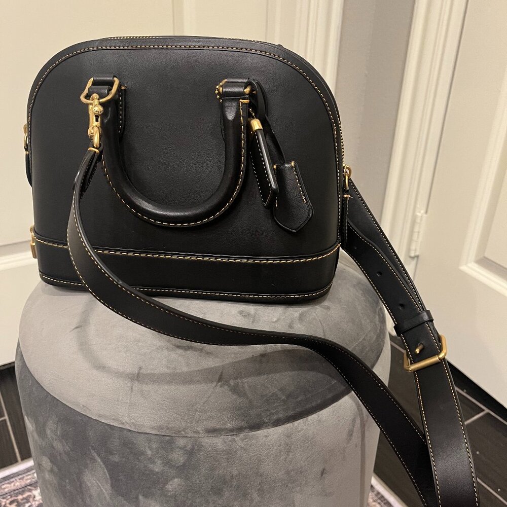 Coach Revel Bag dome‑shaped satchel made from buttery glovetanned leather